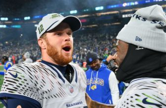 Darnold shows grit as Seahawks rally, clinch postseason berth