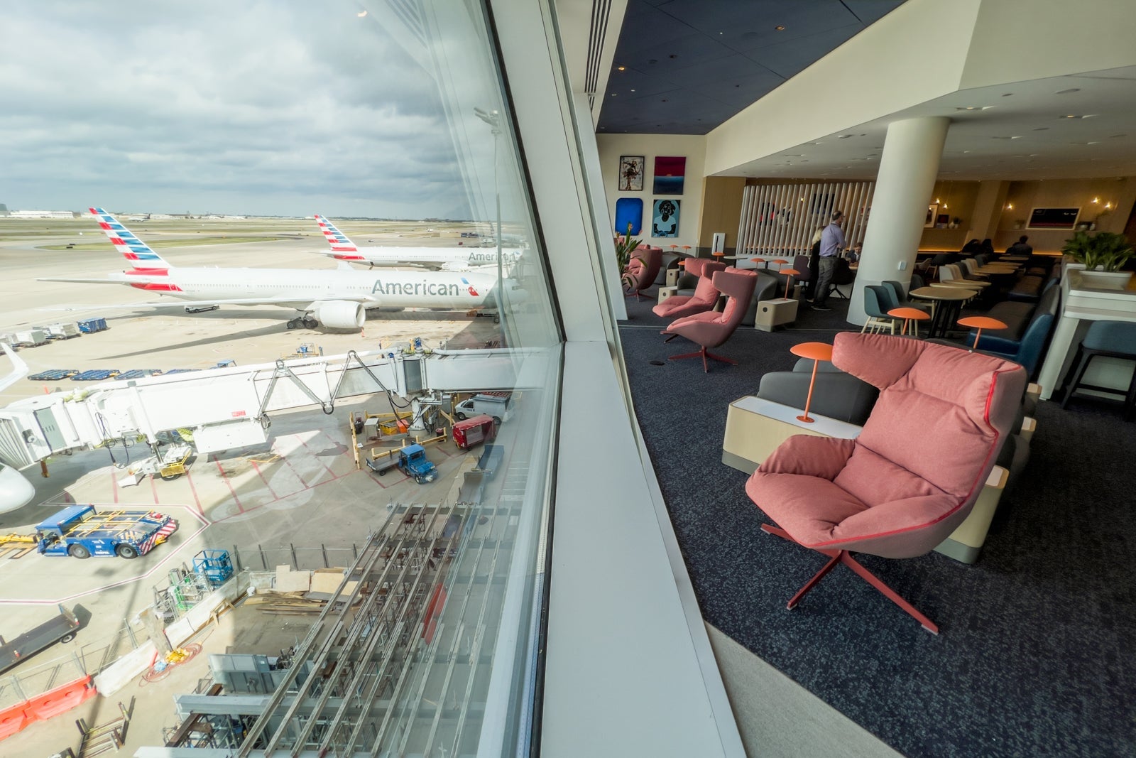 Chairs overlooking the tarmac from the Capital One lounge at DFW airport