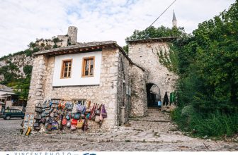 Bags and other local souvenirs at the entrance to the town of Pocitelj in Bosnia.