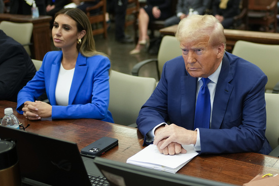 Former President Donald Trump, right, flanked by his defense attorney, Alina Habba, waits for the continuation of his civil business fraud trial at New York Supreme Court, Wednesday, Oct. 25, 2023, in New York. (AP Photo/Seth Wenig, Pool) Former President Donald Trump, right, flanked by his defense attorney, Alina Habba, waits for the continuation of his civil business fraud trial at New York Supreme Court, Wednesday, Oct. 25, 2023, in New York. (AP Photo/Seth Wenig, Pool)