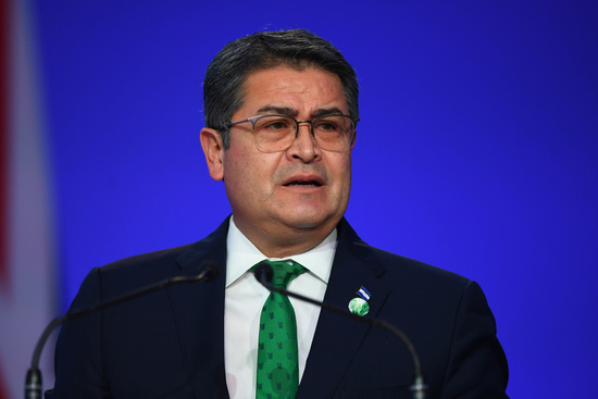 FILE - Honduras' President Juan Orlando Hernandez speaks during the opening ceremony of the UN Climate Change Conference COP26 in Glasgow, Scotland, Monday Nov. 1, 2021.  Andy Buchanan/Pool via AP, File)