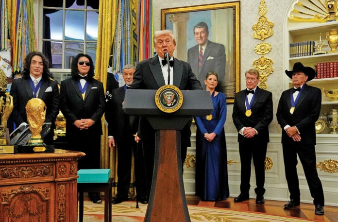 Above, President Donald Trump speaks in the Oval Office after presenting Sylvester Stallone, George Strait, KISS, Gloria Gaynor, and Michael Crawford with Kennedy Center Honors medals, Saturday, Dec. 6, 2025. (Julia Demaree Nikhinson/AP)