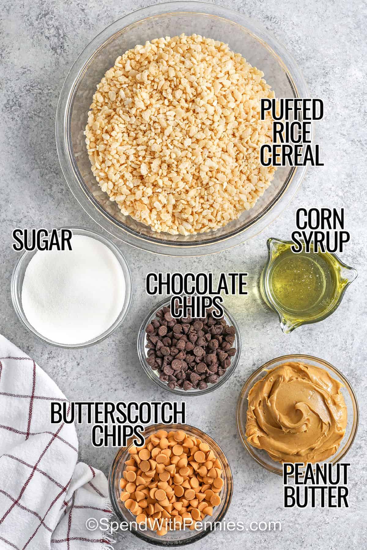 puffed rice cereal , sugar , chocolate chips , butterscotch chips , corn syrup and peanut butter to make Scotcheroos