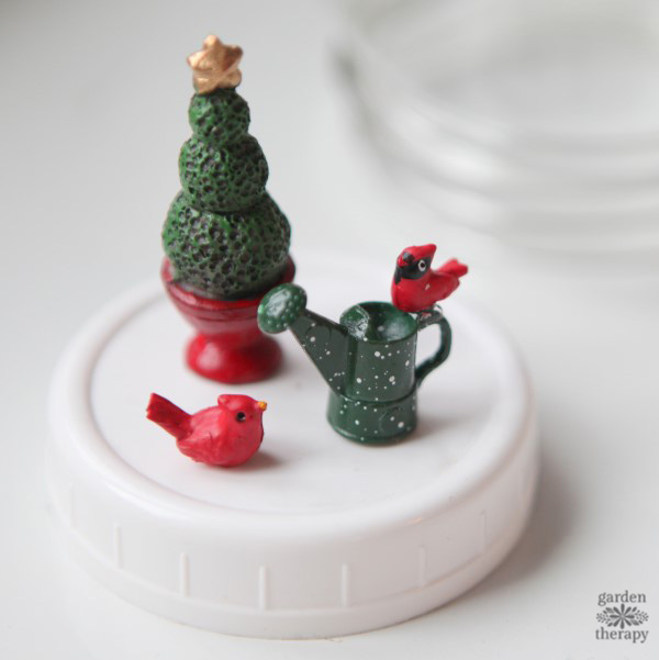 Make a mini garden snow globe.