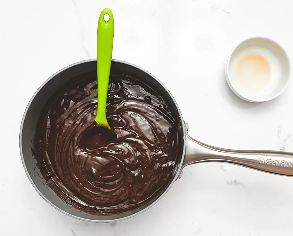 Stirring in vanilla extract