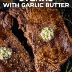 Two cooked cast iron steaks topped with garlic butter in a skillet, surrounded by herbs, with text overlay about making cast iron steaks with garlic butter.