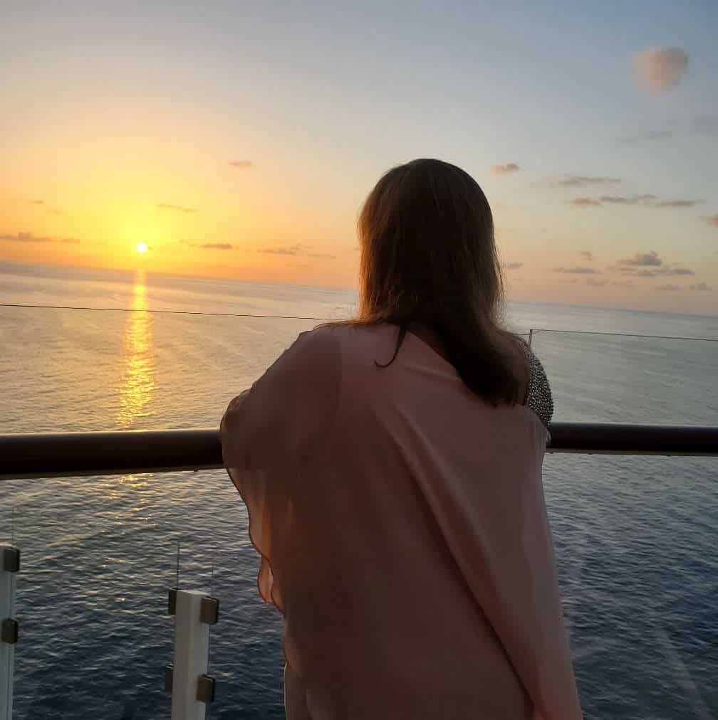 I'm enjoying the sunset while on a solo Caribbean cruise