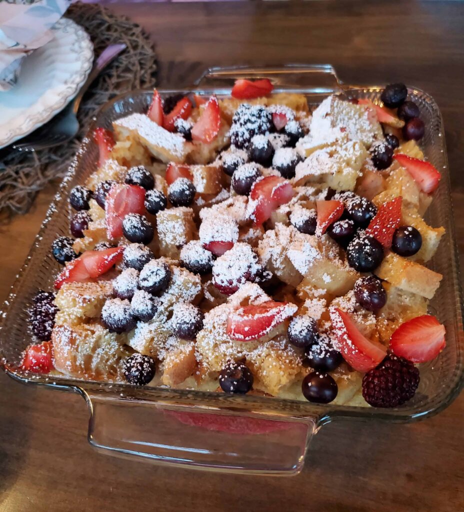 Bread pudding topped with various fruit and icing sugar starts the day when staying at The Blue Bruce BnB in St. Jacobs