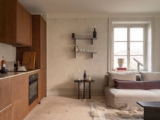 A contemporary home with modern furniture and limewash walls