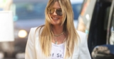 Heidi Klum Flashes Her Underwear in Plunging Christian Siriano Lace-up Dress
